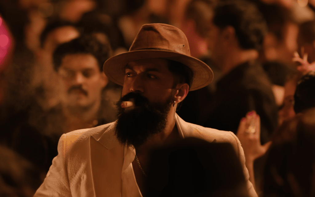 Yash in his first look from 'Toxic', showcasing a gangster-inspired avatar with a white suit and fedora.